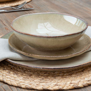 Wycliffe stoneware bowl set on a matching dinner plate with linen