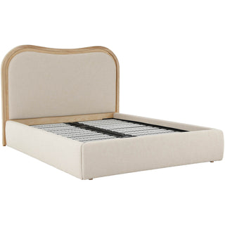 Wycombe organic-modern bed with curved oak surround styled with layered linen bedding