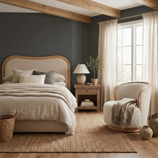 Wycombe curved upholstered bed with arched oak frame and natural linen headboard in a neutral bedroom