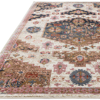 Close-up of the Zola Aras rug pattern in terracotta and blue
