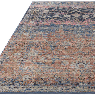 Close-up of the Zola Fasa rug pattern in terracotta and pink