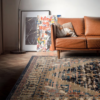 Zola Razan traditional rug in blue and red styled in a living room