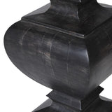 The balustrade-shaped lamp base is hand-carved from mango wood.