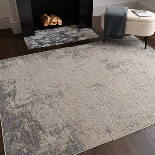 Anders abstract rug in ivory and grey styled in a living room