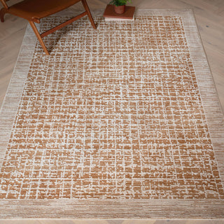 Anders grid rug in warm tan and mocha styled in a living room