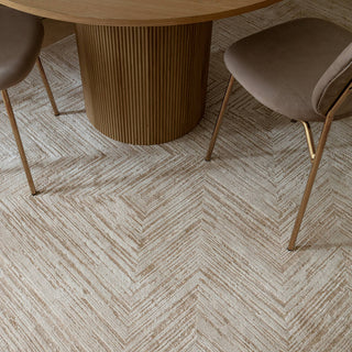 Close-up of the Anders chevron rug in cream and warm beige showing the space-dyed pile