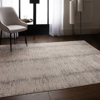 Anders brushstroke rug in light grey and charcoal styled in a living room