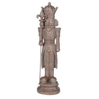 Large 93cm carved wood effect nutcracker statue on a round plinth, front view