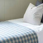 Made from 100% cotton, the Brighton blue gingham throw is both beautiful and functional. Draped over a sofa for an added layer of texture, its blue and white colour palette finishes off your space with an effortless look and feel. &nbsp;