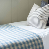 Made from 100% cotton, the Brighton blue gingham throw is both beautiful and functional. Draped over a sofa for an added layer of texture, its blue and white colour palette finishes off your space with an effortless look and feel. &nbsp;