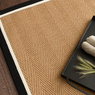 Close-up of the charcoal and cream herringbone jute weave
