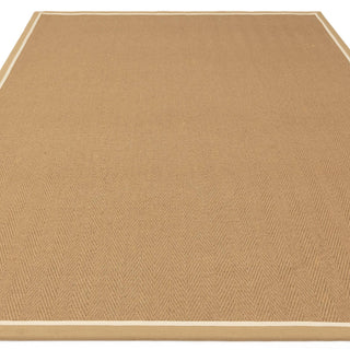 Bordo linen herringbone rug corner and woven border detail