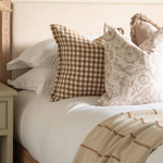 Made from 100% cotton, the Worthing Striped Throw is both beautiful and functional. Draped over a sofa for an added layer of texture, its natural and tan colour palette finishes off your space with an effortless look and feel.
