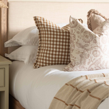Made from 100% cotton, the Worthing Striped Throw is both beautiful and functional. Draped over a sofa for an added layer of texture, its natural and tan colour palette finishes off your space with an effortless look and feel.