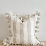 Beige and cream striped cushion with ruffled edges