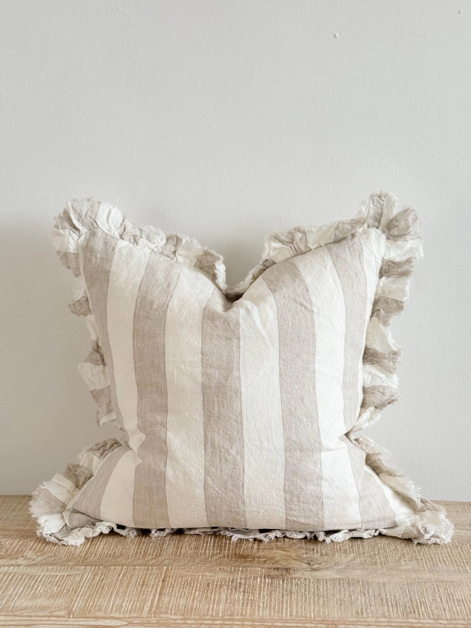 Beige and cream striped cushion with ruffled edges