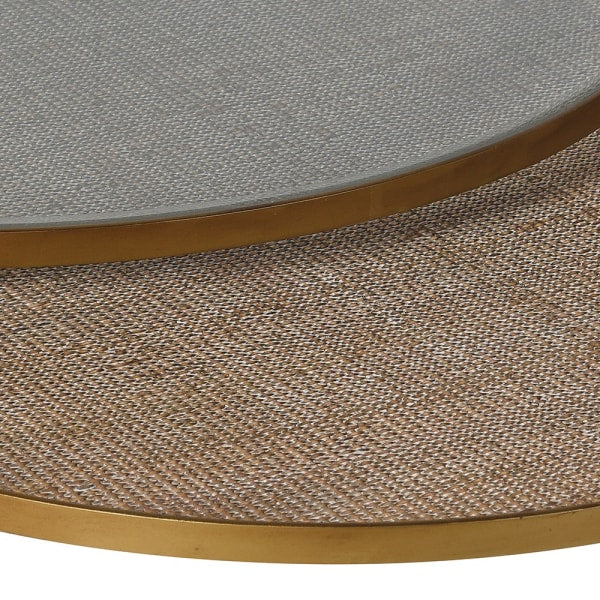 Close up of the rattan top of the smaller table showing through the glass of the larger table