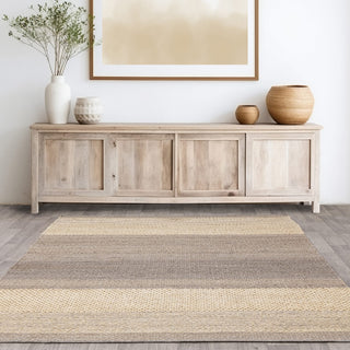 Cedar handwoven jute rug in grey styled in a living room