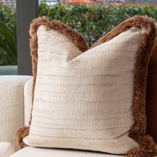 Close up of the champagne cushion geometric weave