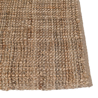 Close-up of textured brown carpet corner