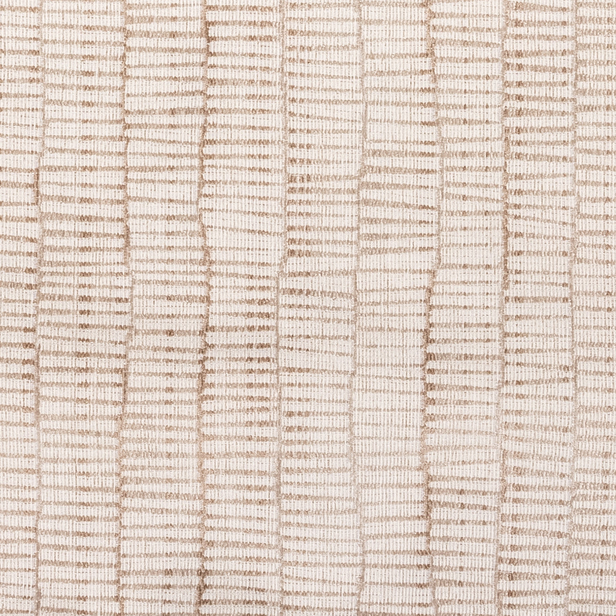 Close up of the cream and beige patterned weave on the Aldworth rectangle cushion