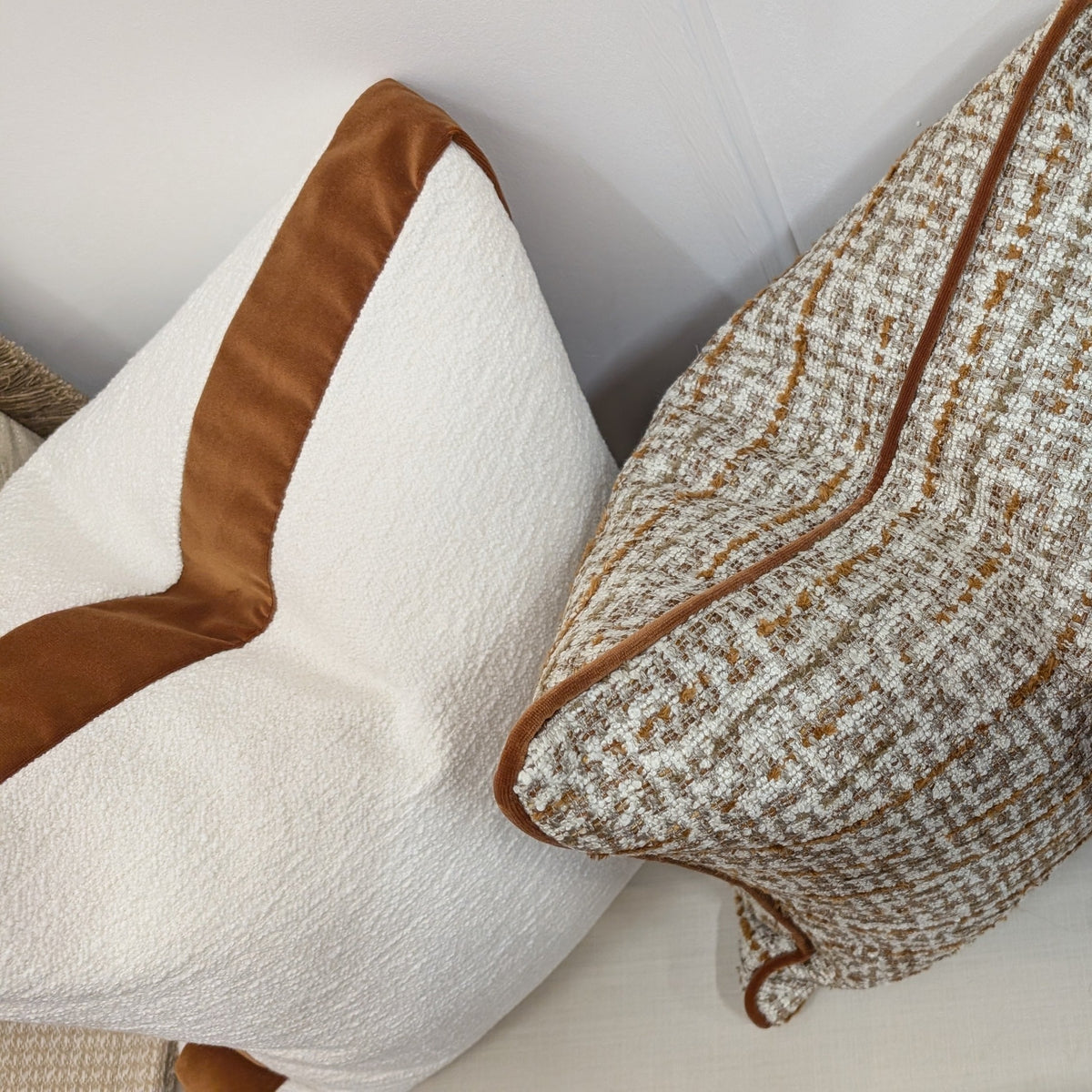 Elkstone cushion trio styled on a sofa