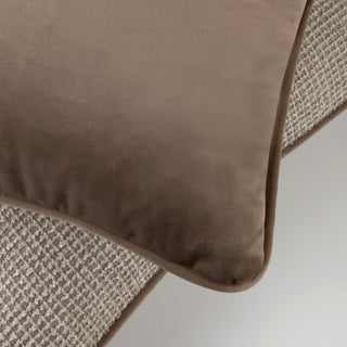 Close up of the tweed style weave and fringe on the Frampton cushion