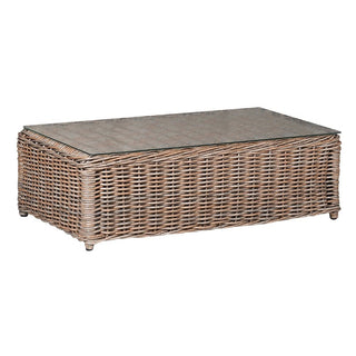 Wicker coffee table with a glass top on a white background