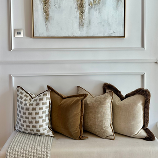 Wellow textured cushion in a neutral living space
