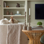 Add a touch of modern sophistication to your home with our elegant metal candlesticks, available in two versatile sizes. Crafted from high-quality metal with a smooth matte finish, these decorative candle holders blend seamlessly with contemporary, minimalist, or rustic decor. Their sculptural design and warm, earthy tones make them the perfect accent for dining tables, mantels, or sideboards.

Ideal for taper candles, these stylish metal candlesticks create an inviting ambiance for any occasion—from cosy d