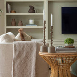 Add a touch of modern sophistication to your home with our elegant metal candlesticks, available in two versatile sizes. Crafted from high-quality metal with a smooth matte finish, these decorative candle holders blend seamlessly with contemporary, minimalist, or rustic decor. Their sculptural design and warm, earthy tones make them the perfect accent for dining tables, mantels, or sideboards.

Ideal for taper candles, these stylish metal candlesticks create an inviting ambiance for any occasion—from cosy d