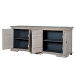 Crafted from recycled pine, this cabinet showcases four doors adorned with bronze metal handles and a rustic finish.