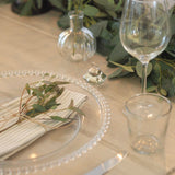 Made from moulded glass these plates feature on their outer edge lovely small glass beads. 