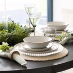 Made from moulded glass these plates feature on their outer edge lovely small glass beads. 
