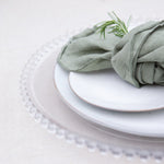 Made from moulded glass these plates feature on their outer edge lovely small glass beads. 