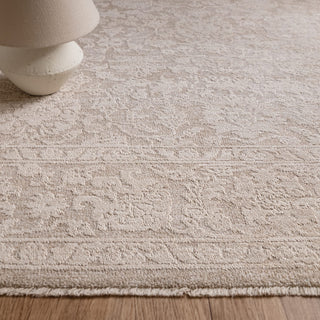 Close-up of the densely woven texture on the Laurent rug in beige and natural