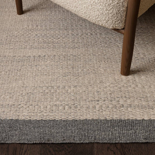 Close-up of the hand-spun wool texture on the Lima rug in grey