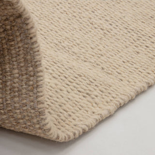 Lima rug in sand, corner detail of the handwoven finish