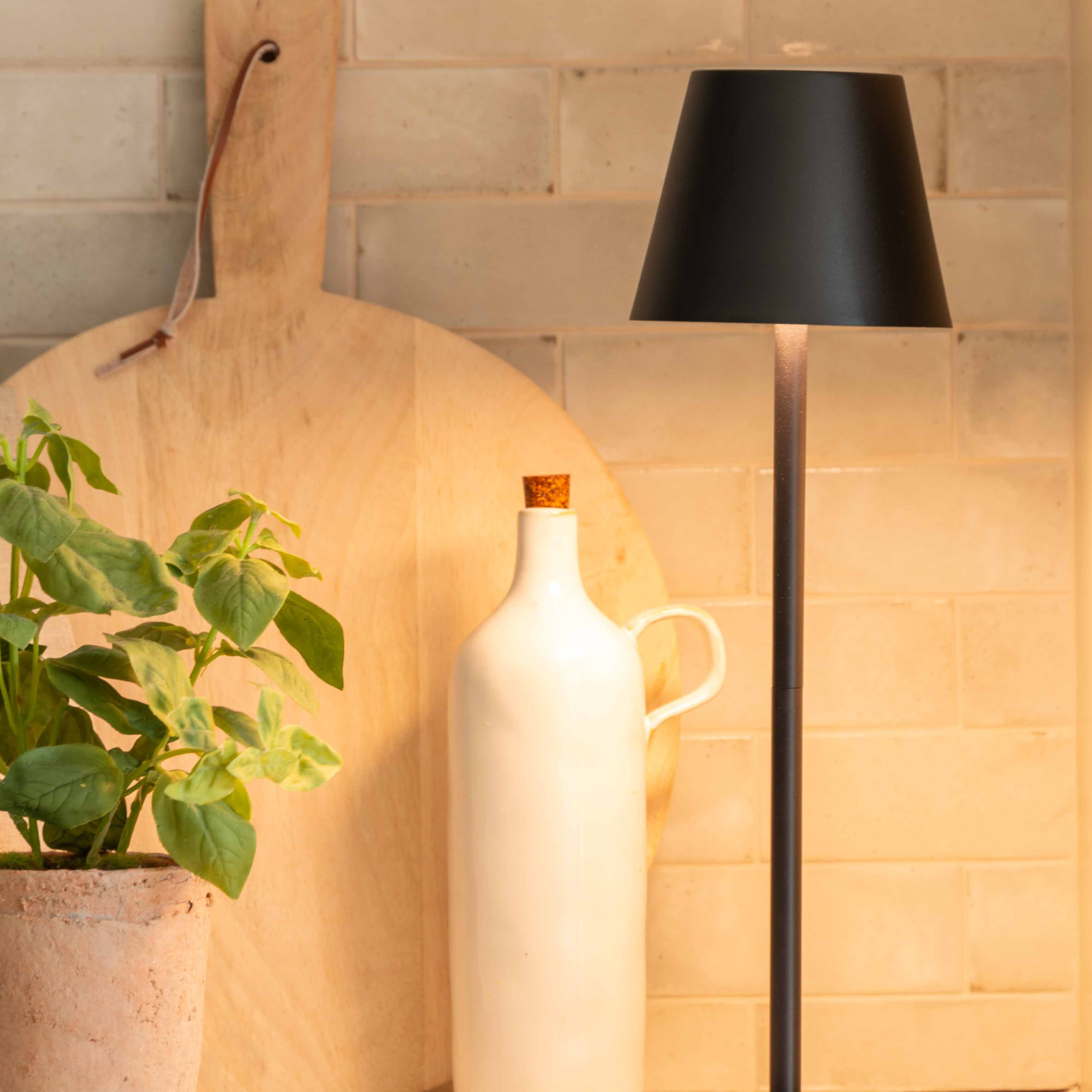 The luxurious Maja Wireless Lamp in sleek black iron boasts a wireless design and can operate for up to 6-16 hours after only 4-6 hours of charging. Its elegant USB-C cable is included for convenience, making it perfect for elevating any space in your home without the need for a plug socket.