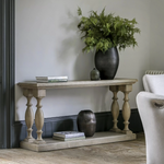 Elevate your home décor with this beautifully crafted rustic pine console table, designed to bring timeless elegance and natural charm to your space. Featuring a weathered finish and classic turned legs, this versatile table blends traditional craftsmanship with modern sophistication. Ideal for hallways, living rooms, or entryways, its spacious double-tiered surface provides ample room for styling with decorative vases, books, or greenery. Whether used as a stylish hallway table or a practical sofa back pie