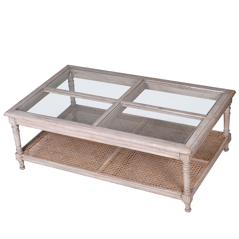 This coffee table is crafted from acacia wood with a rattan and glass top.