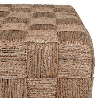 Woven natural fiber cube stool with a basketweave pattern on a white background