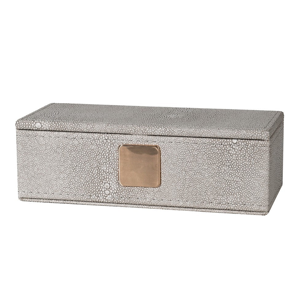 exquisite faux shagreen box with lid and complemented by a plush velvet interior.