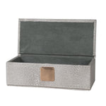exquisite faux shagreen box with lid and complemented by a plush velvet interior.