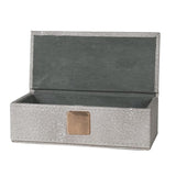 exquisite faux shagreen box with lid and complemented by a plush velvet interior.