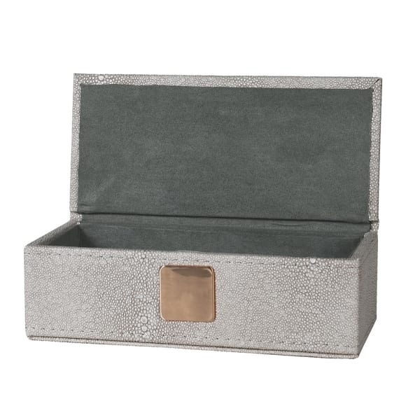exquisite faux shagreen box with lid and complemented by a plush velvet interior.