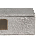 exquisite faux shagreen box with lid and complemented by a plush velvet interior.