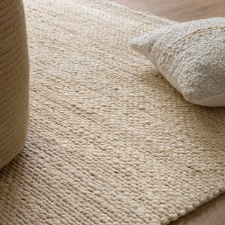 Close-up of the twisted jute weave on the Simplicity rug in blonde