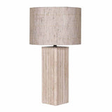 close-up of travertine lamp base and textured linen shade