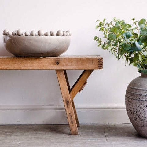 Beautiful ceramic bowl with balls around the rim.